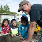 New Castle County Master Gardeners work with students at UD's Early Learning Center.