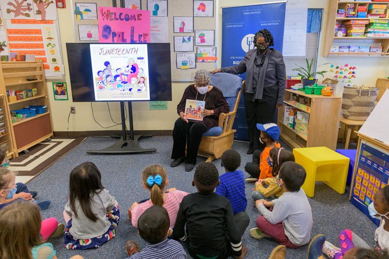 Civil rights activist and self-described "Grandmother of Juneteenth," Opal Lee reads to students at the Early Learning Center, as part of her visit to the University of Delaware.