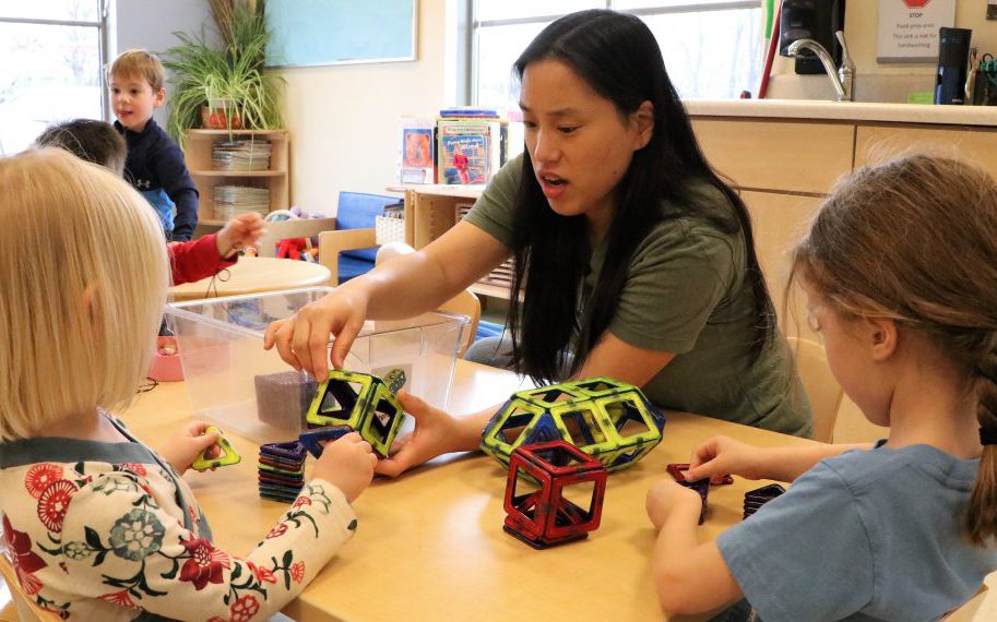 Teacher and students at UD Early Learning Center