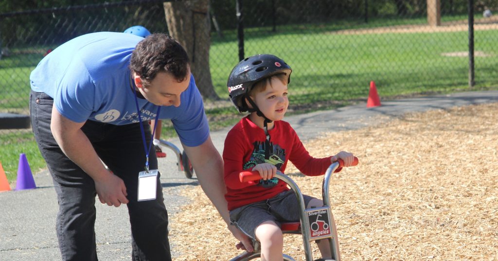 Student observing a child at The Early Learning Center